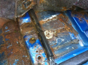 broken bracket and a shot of some of the rust