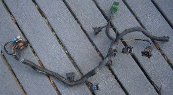 Six F/I connectors, one 2-pin ECT connector, one MAP sensor connector,<br />a 10-pin harness connector, and the white 2-pin harness connector for the ECT wires.  Could use a good bath.