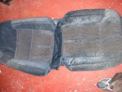 Seat from the passenger side of the parts car. It was covered in dirt and grease from parts sitting on it for 10 years. I cleaned it up and it looks really good.