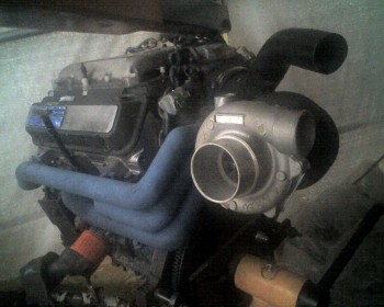 11-21-10_1009.jpg (242.3 KiB) Viewed 5023 times It took two tries to get this engine working right in the car. I bought it from the salvage yard for $60 with a 'blown head gasket' that was actually a blown-out LIMG. I didn't know that it had already spun the rear main bearing, so it developed no oil-pressure once warm. I pulled it out, and later re-built it into this.