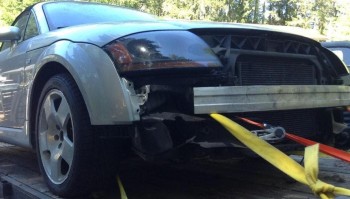 ...Except for the front bumper-cover.  It was included, just not installed. A few cracks, but nothing beyond repair.