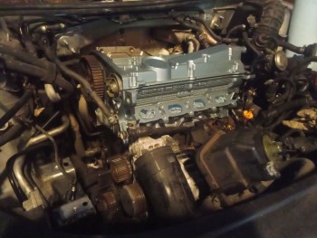 This is pretty much how it sits right now, except that I also installed a new Gates Belt, new tensioner, tensioner pulley, idler pulley, and water-pump. That was it PITA...